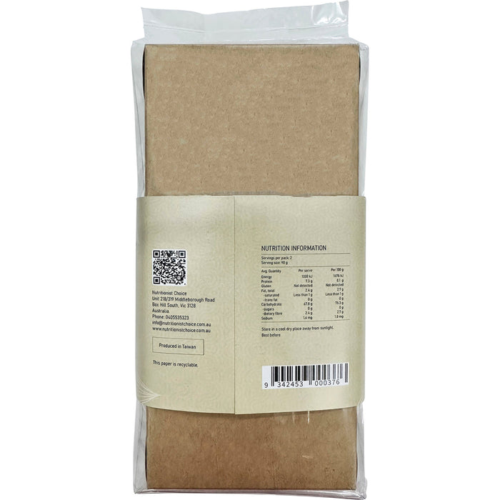 Back view of a brown paper package with nutritional information and QR code on a white background
