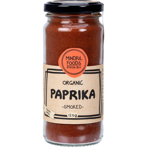 Jar of organic smoked paprika with a label on a white background