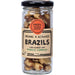 Jar of organic and activated brazils with a label on a white background