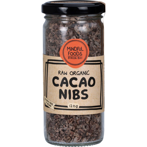 Jar of raw organic cacao nibs with a Mindful Foods label on a white background