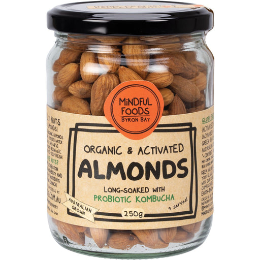 Jar of organic and activated almonds with a 'Mindful Foods Byron Bay' label on a white background