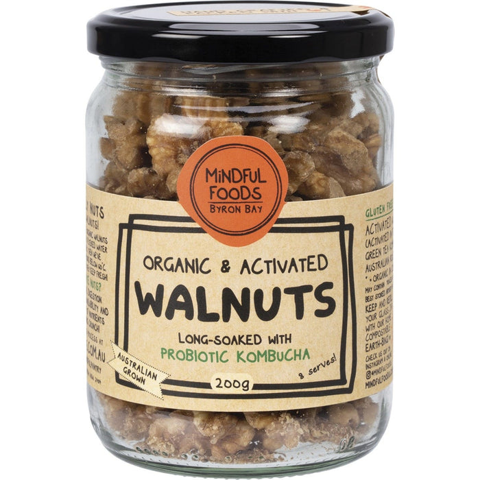 Jar of organic and activated walnuts with a label on a white background