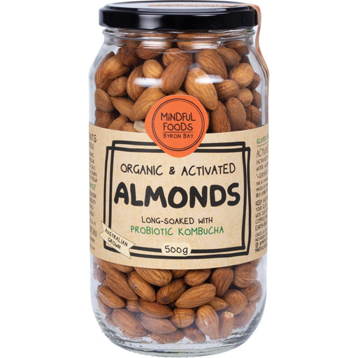 Jar of organic and activated almonds with a label on a white background