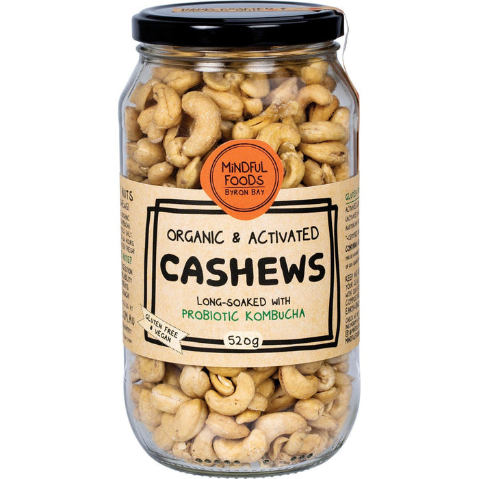 Jar of organic and activated cashews with a label on a white background