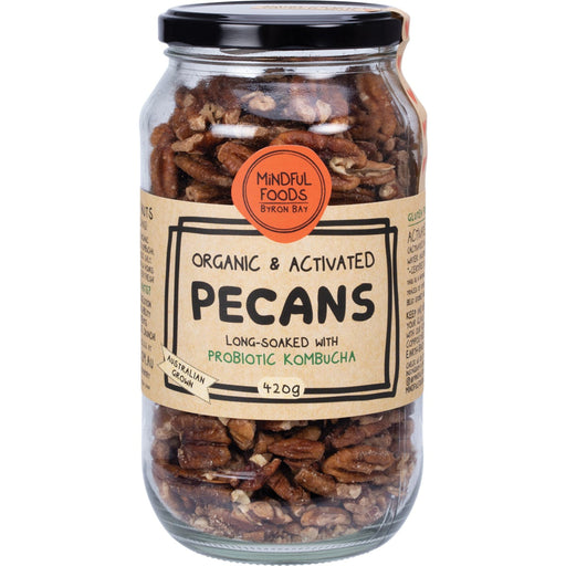 Jar of organic and activated pecans with a label on a white background
