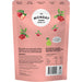 Pink packaging of The Monday Food Co with strawberry and cranberry graphics on a white background