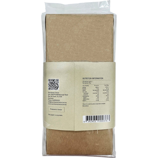 Back view of a brown paper package with nutritional information and QR code on a white background